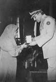 Malika Pukhraj receiving award from Zia-ul-Haq